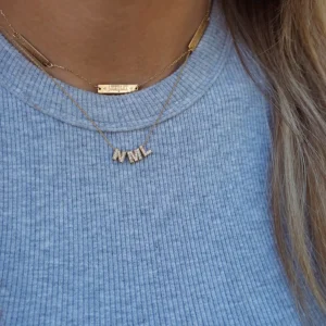 Minitials Pave initiaal met collier