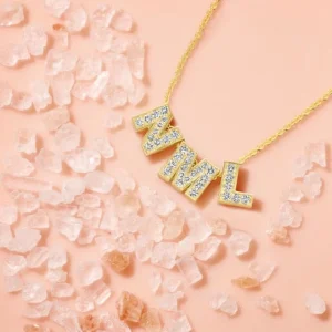 Minitials Pave initiaal met collier